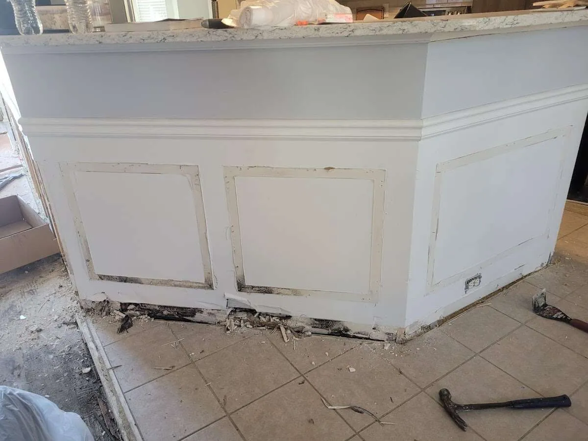 Water damage and mold on kitchen during Storm Damage Restoration in Orange